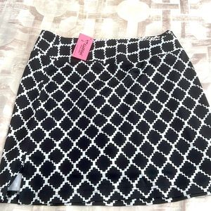 Golftini size L skort, brand new, 18” long, waist 16”,